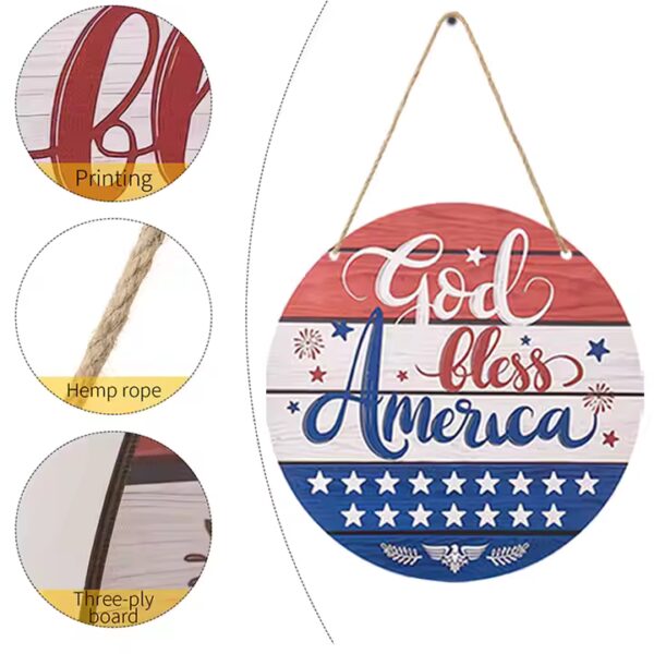 Patriotic round wood sign: "God Bless America," red, white, and blue. Hemp rope hanger.