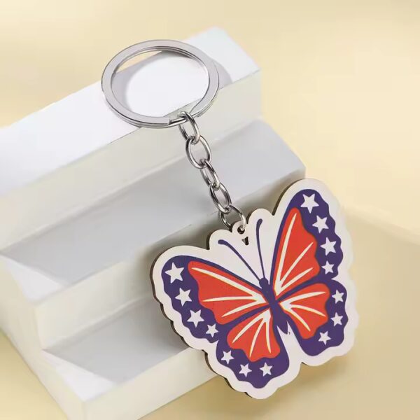 Patriotic butterfly keychain. Wood keychain with USA flag colors.