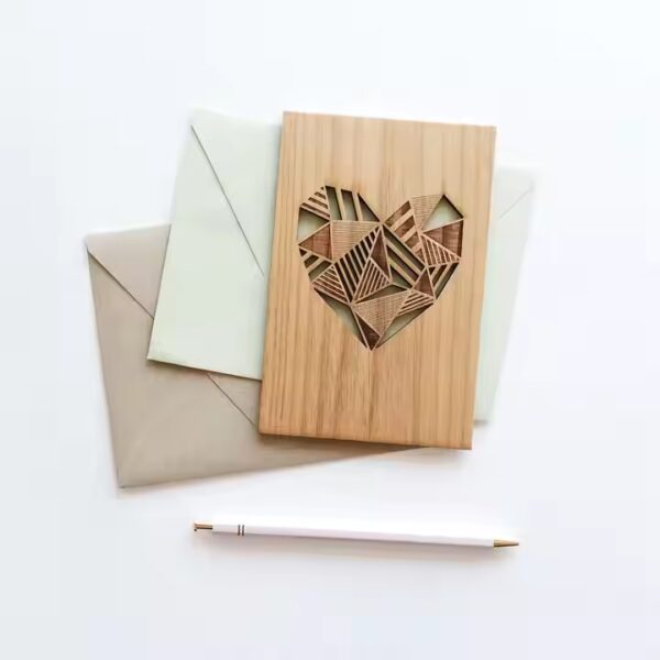 Laser-engraved wood ranch gift card in a beige envelope. Custom wood gifts.